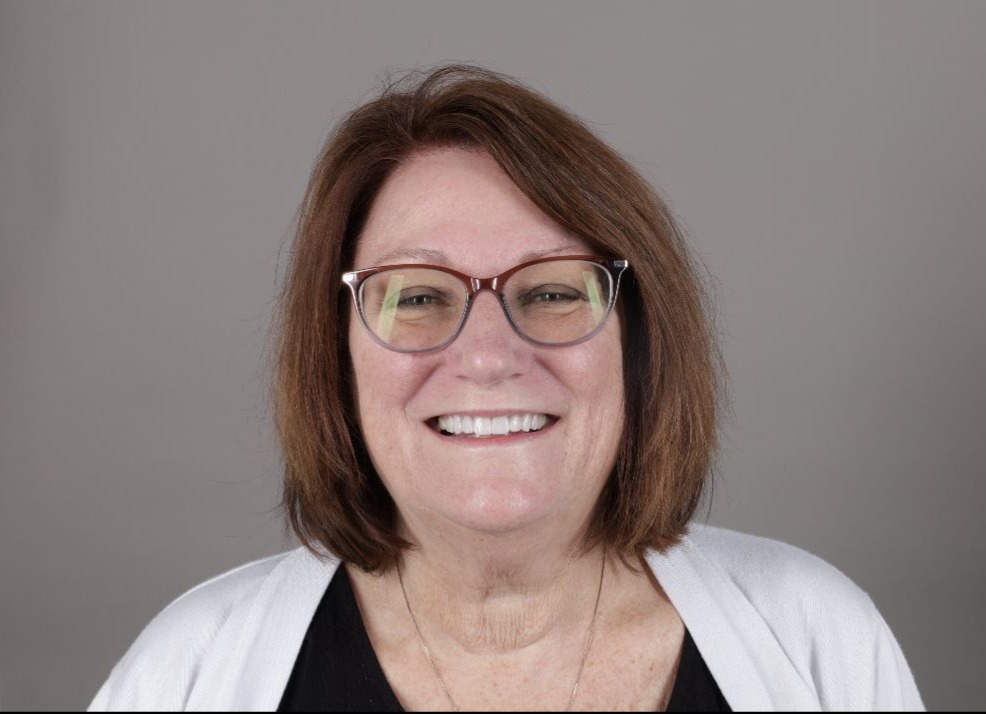After Sylvia, eight upper veneers, natural balance